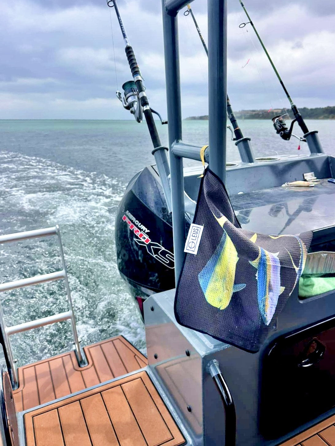 Abachar Fish Stack Fishing Eco Towel: on the boat with the wake behind - Leus Towels Australia