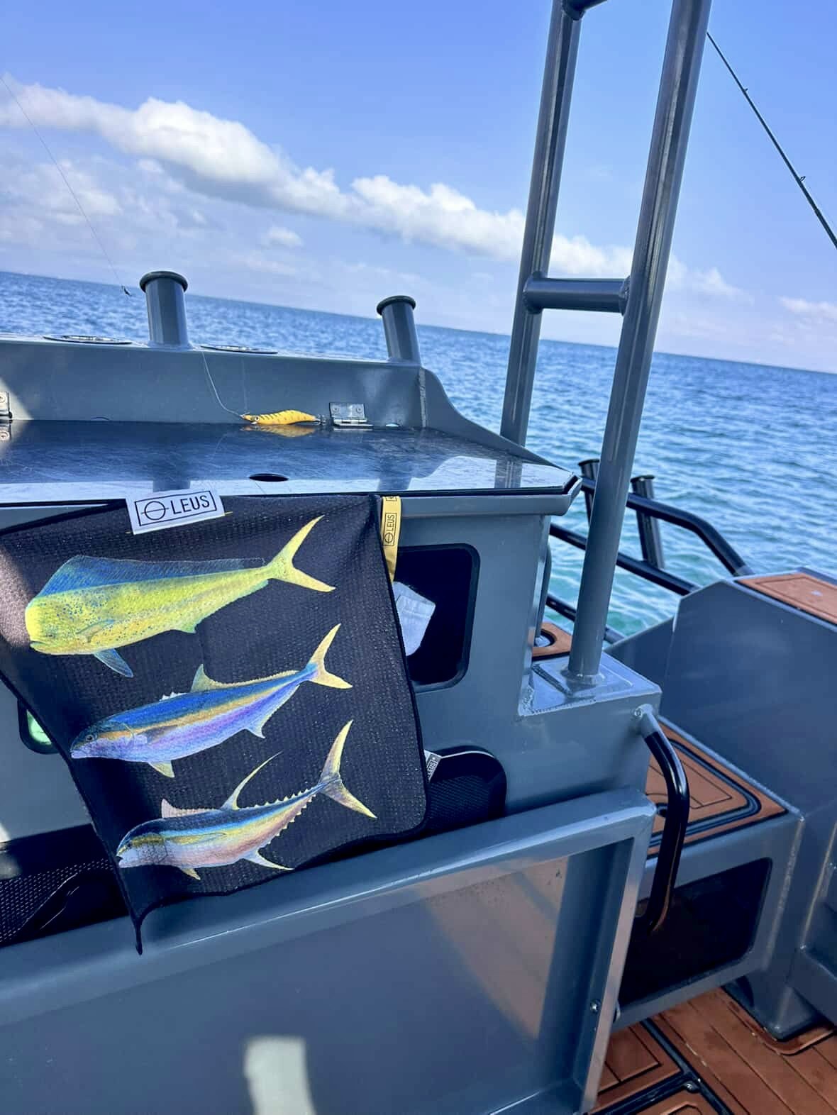 Abachar Fish Stack Fishing Eco Towel: hanging on a fishing boat - Leus Towels Australia