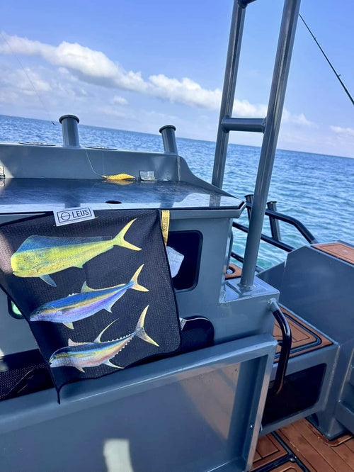 Abachar Fish Stack Fishing Eco Towel: hanging on a fishing boat - Leus Towels Australia