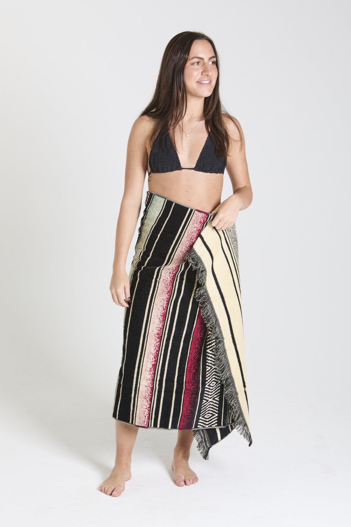 Baja Sur Beach Eco Towel: model draped in the towel - Leus Towels Australia