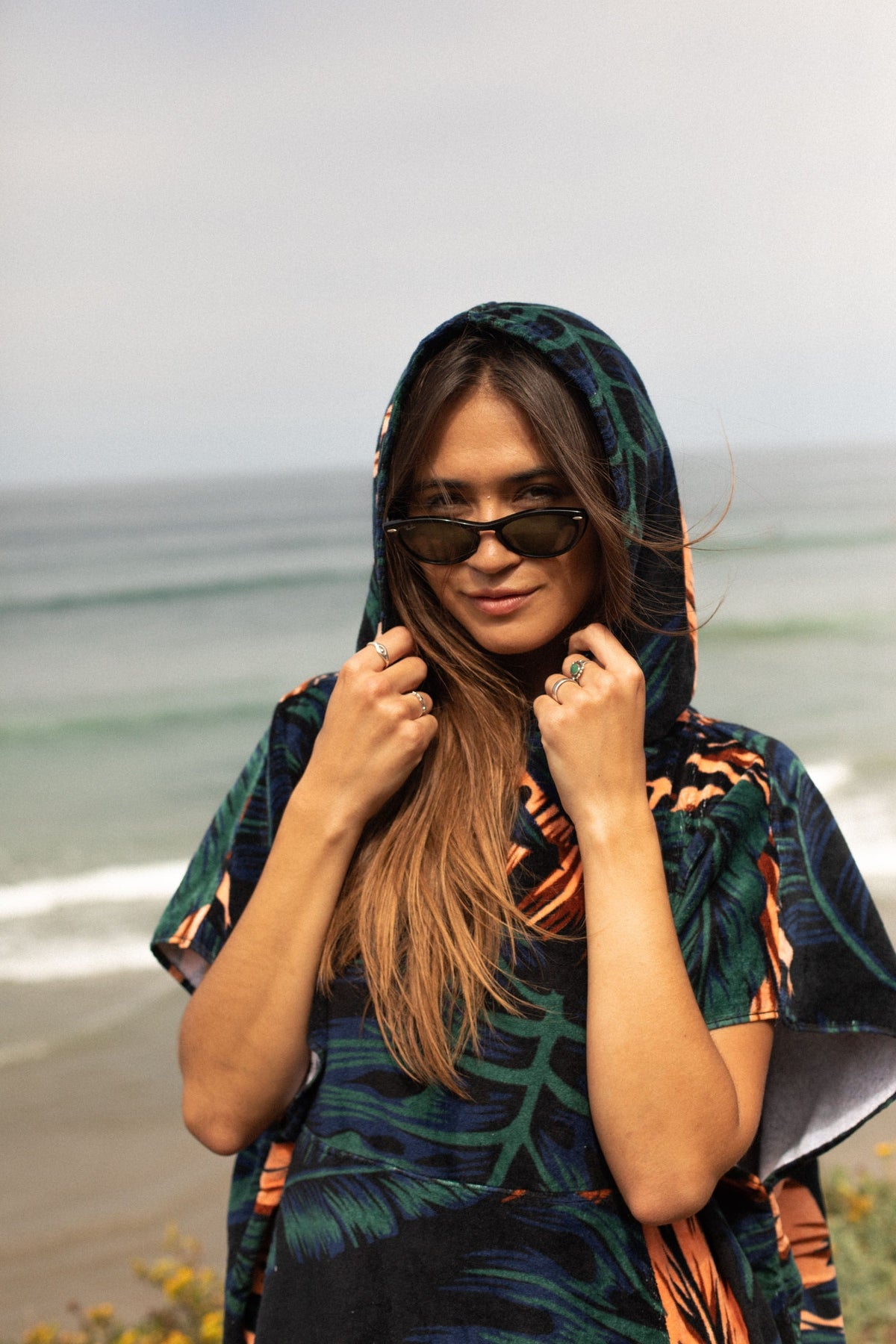 Jungle Madness Original Eco Poncho: woman hooded at the beach - Leus Towels Australia